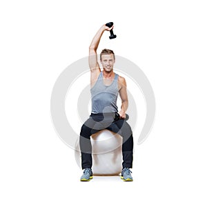 Man, ball or portrait in studio for dumbbell workout performance, wellness or white background. Strong male athlete