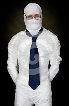 Man in bandage with eyeglasses and the cravat photo