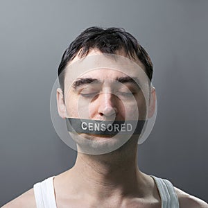 Man with bandage on face photo