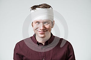 Man with bandage on his head photo