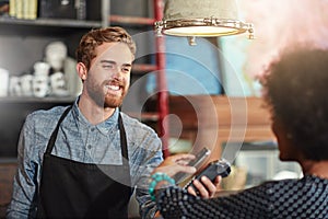 Man, barista and client with smartphone payment, cafe and transaction for services, smile and fintech. Female customer