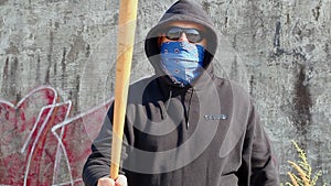 Man with a baseball bat