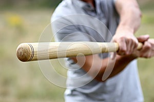 Man with baseball bat playing baseball sport concept