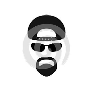 Man with baseball cap, sunglasses and goatee.