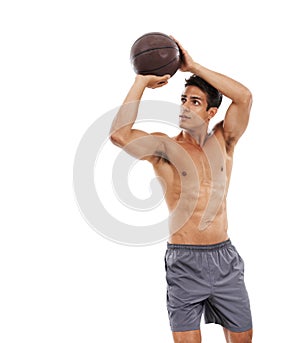Man, basketball and shooting on mockup space for scoring point or game on a white studio background. Active young male