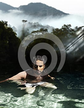 Man bathing in tropical waters