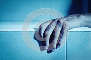 Man on a bathtub in a creepy atmosphere