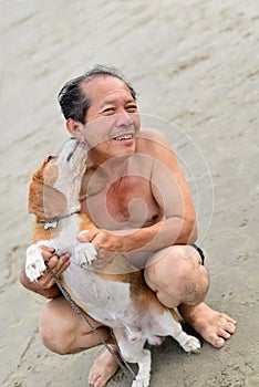 Man with beagle dog