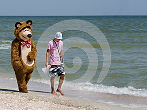 A man with a bear