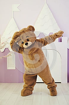 man in a bear costume, holiday entertainment