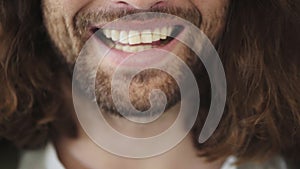 Man beard, closeup and smile on mouth, teeth and healthy facial hair with happiness, wellness and funny moment. Zoom