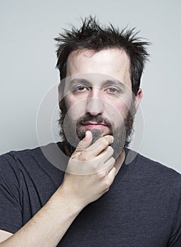 Man with beard, deep in thought