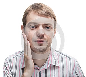 Man with a beard on half of the face.