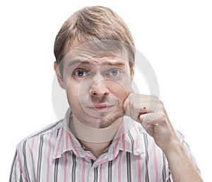 Man with a beard on half of the face.