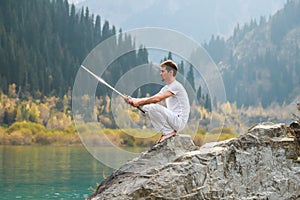 A man with a beard lowered his battle sword. Male defeat