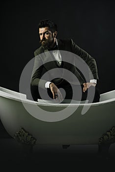 Man with beard and mustache on dark background