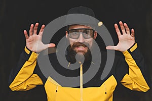 Man with beard poses ridiculously