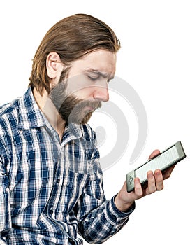 Man with a beard reading the electronic book