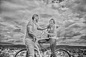 Man with beard and shy blonde lady on first date. How to meet girls while riding bike. Picking up girl. Couple just meet