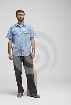 Man with beard standing in studio 02