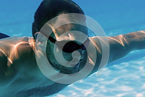 Man with Beard Underwater swimming pool Young beard man with glasses Underwater