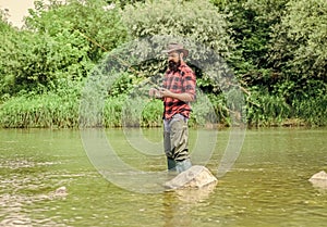 Man bearded fisherman. Fish farming pisciculture raising fish commercially. River lake lagoon pond. Trout farm