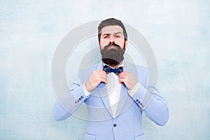 Man bearded hipster formal suit with bow tie. Wedding fashion. Formal style perfect outfit. Impeccable groom. Tips for