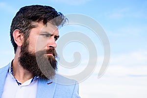 Man bearded hipster with mustache blue sky background. Ultimate mustache grooming guide. Expert tips for growing and