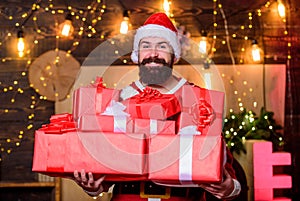 Man bearded santa celebrate christmas with presents. May your home be filled with all joys of season. New year