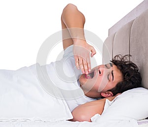 Man in bed suffering from insomnia