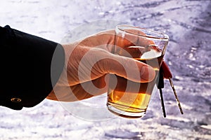 Man behind car key and glass