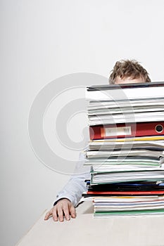 Man behind paperwork