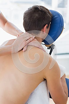 Man being massaged by therapist