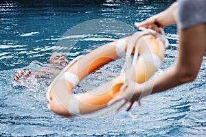 Man being rescued from the water