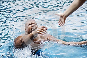 Man being rescued from the water