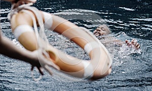 Man being rescued from the water