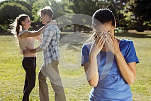 Man being unfaithful in the park