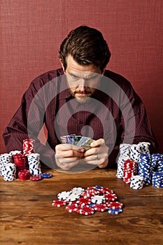 Man betting with credit cards