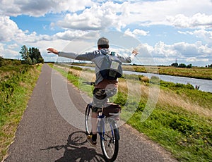 Man on bicycle having fun