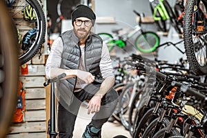 Man with bicycle at the store