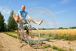 Man bicycling photo