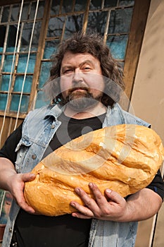 Man with big bread