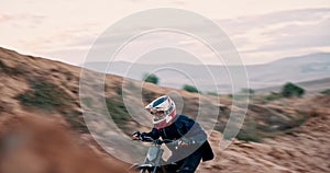 Man, bike and off road for race, action or adventure on sand at cycling rally in Dubai. Electric bicycle, professional