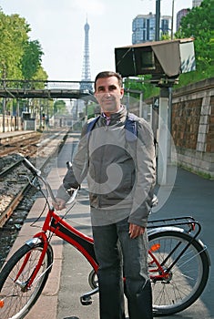 Man with bike in Paris photo