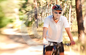 Man on the bike in the sunny