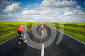 Man biking on road