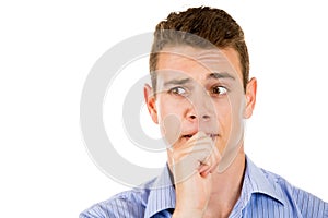 Man biting his thumb fingernail or finger in mouth photo