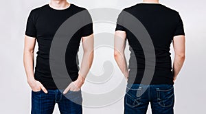 Man in black blank tshirt on gray background