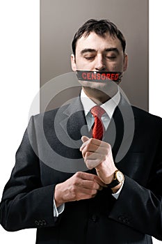 Man with black censored tape