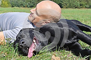 Man with black dog